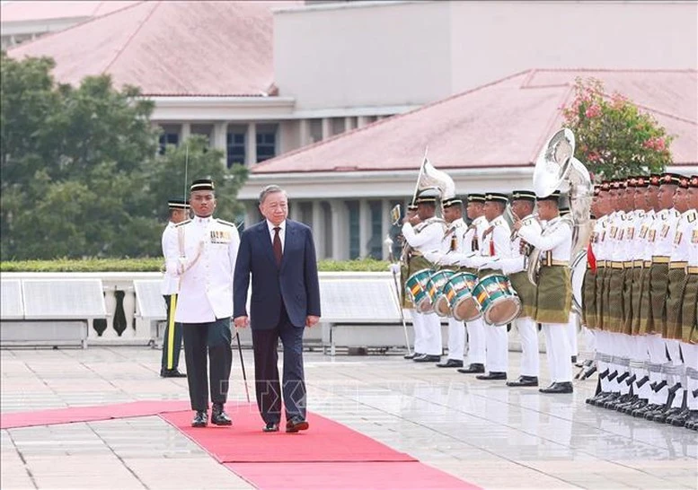 Thủ tướng Malaysia Anwar Ibrahim chủ trì lễ đón Tổng Bí thư Tô Lâm- Ảnh 4.