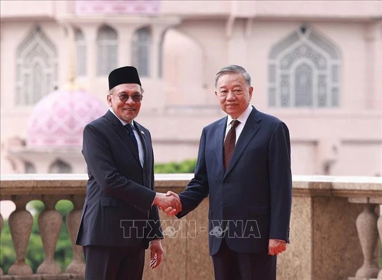 Thủ tướng Malaysia Anwar Ibrahim chủ trì lễ đón Tổng Bí thư Tô Lâm- Ảnh 7.