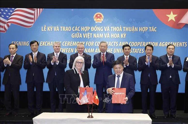 Tổng Bí thư Tô Lâm chứng kiến lễ ký và trao các thoả thuận hợp tác giữa Việt Nam và Hoa Kỳ- Ảnh 1.